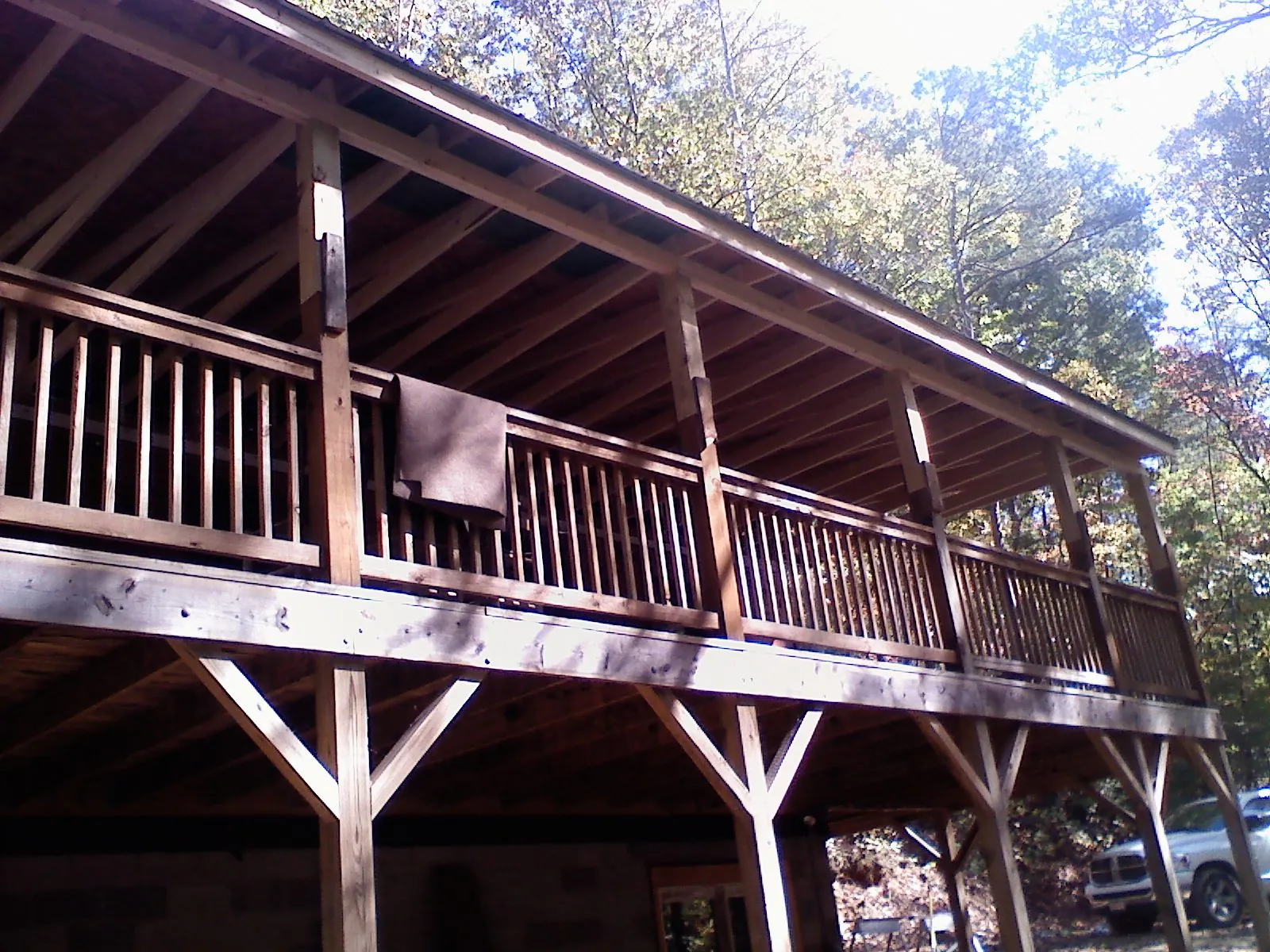 Timber framing under a new elevated porch and deck — Roof Leak Repair in Cannon Beach by Roofing Brothers